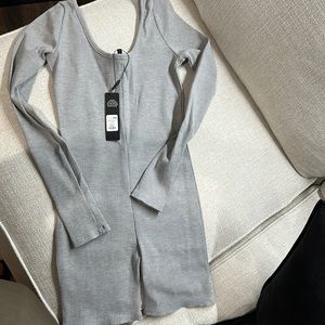 Fashion nova jumpsuit fits sizes S M L form fitting